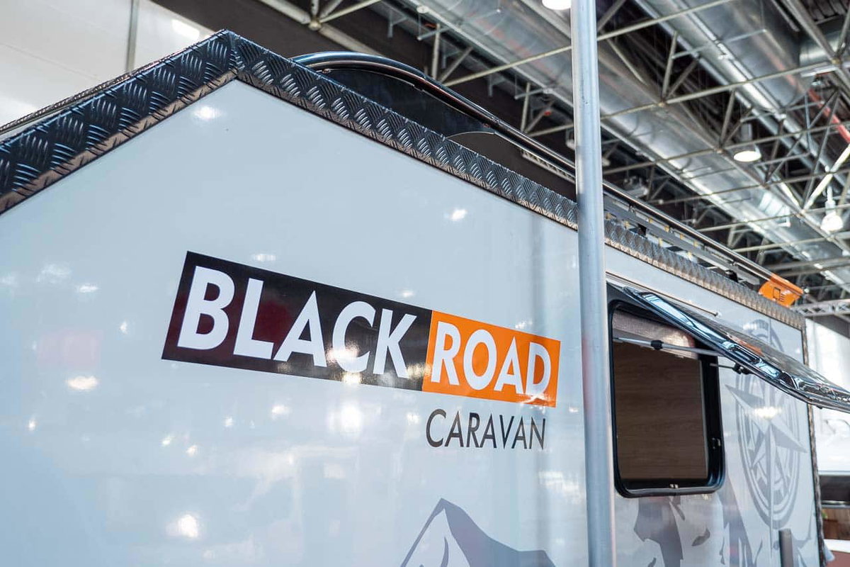 Blyss Speedcaravan Black Road Logo