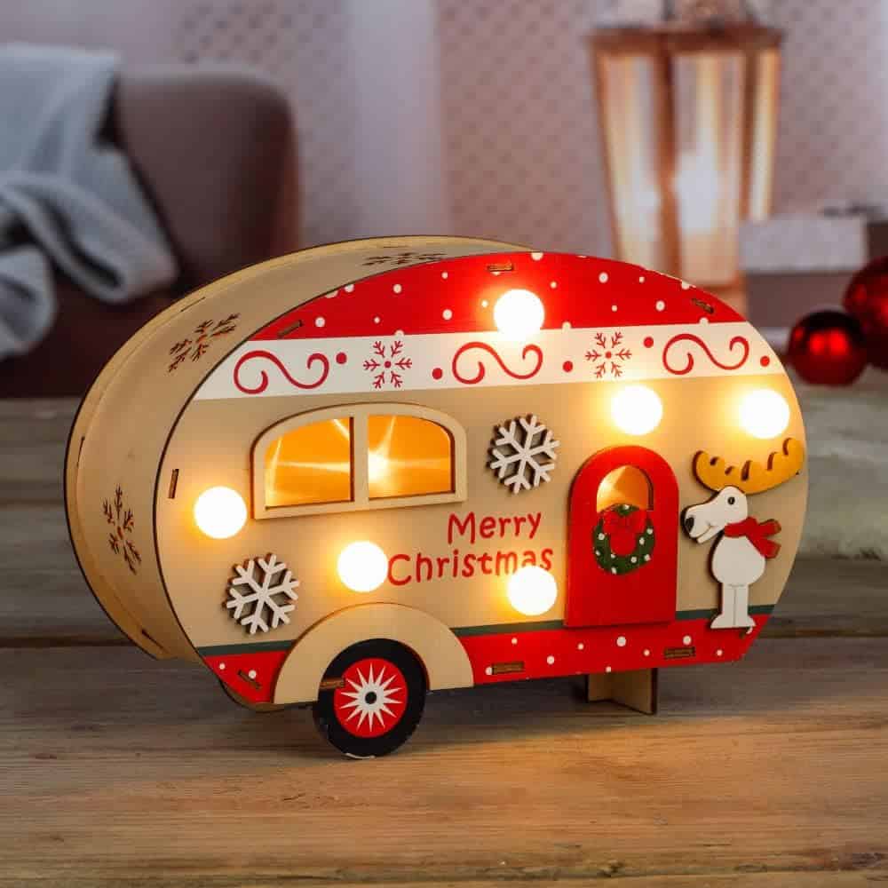 Stimmungsvolles Weihnachtslicht im Camper-Design mit Schneeflocken, Rentier und „Merry Christmas“-Motiv.